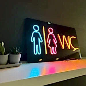 yan açıdan çekilmiş bayan erkek figürlü neon wc tuvalet tabelası